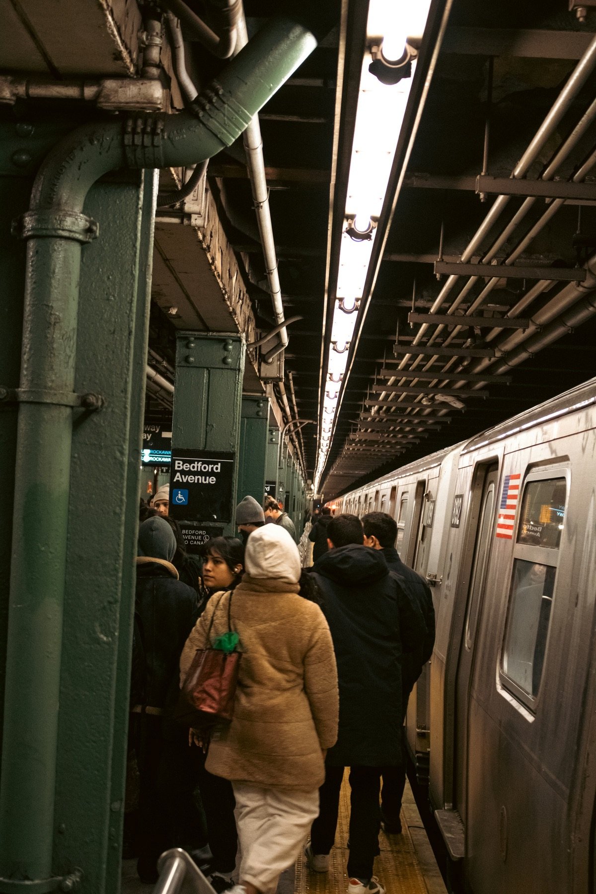 Commuters on a New York subway platform.